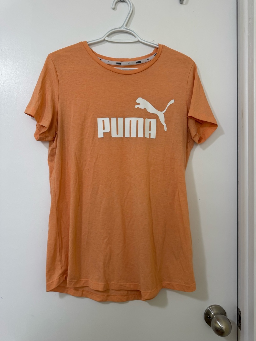 Puma Women's Short Sleeve Logo Tee in Peach Orange